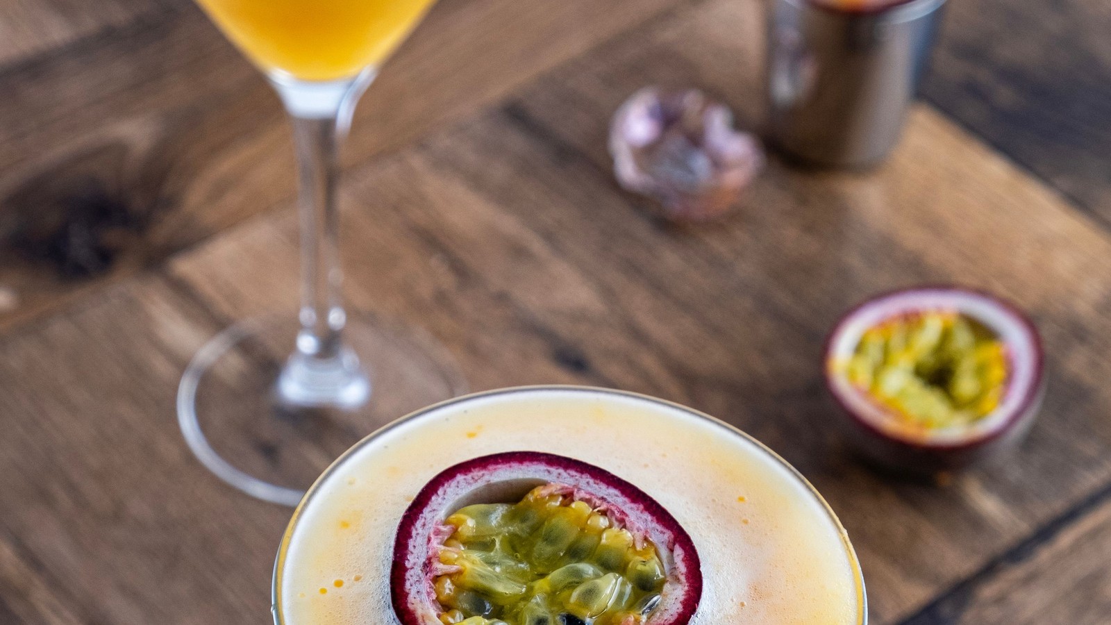 Illustrative stock photo of a lilikoi (passion fruit) martini.